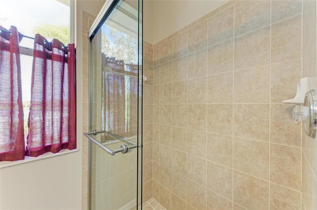 bathroom with a stall shower