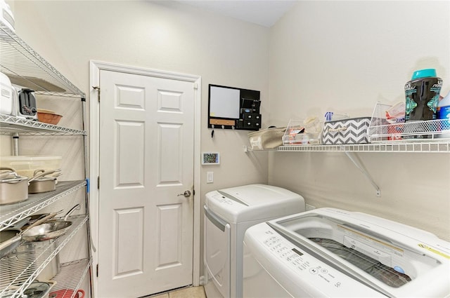 laundry area featuring laundry area and washing machine and dryer