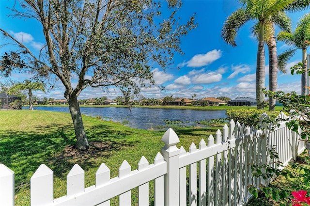 view of water feature with fence