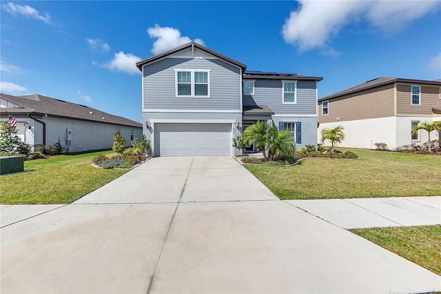 view of front of property with an attached garage, concrete driveway, and a front yard