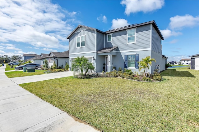 view of front of house with an attached garage, driveway, a front lawn, and stucco siding