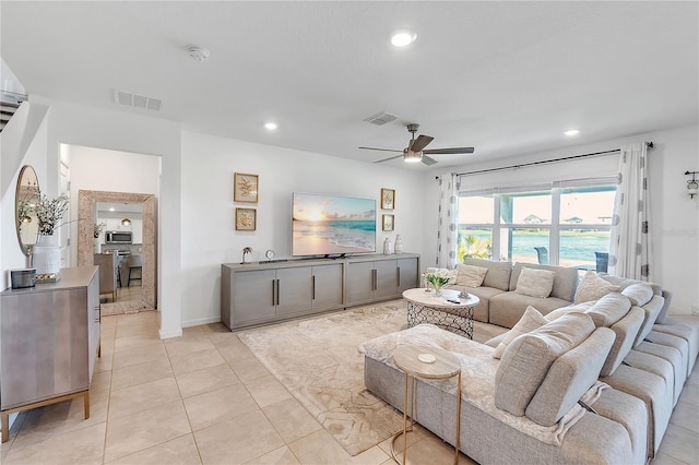 living area featuring recessed lighting, visible vents, a ceiling fan, and light tile patterned flooring