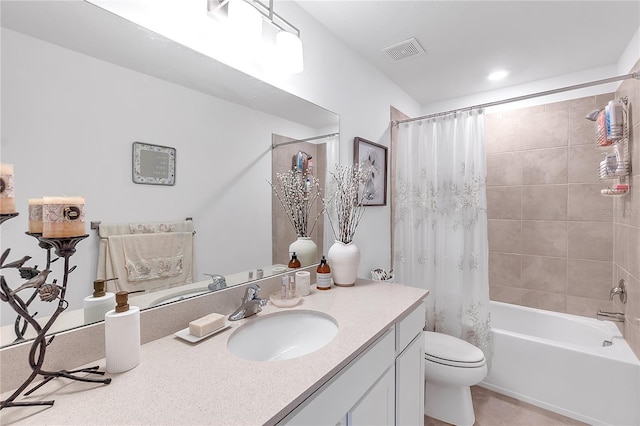 full bathroom featuring visible vents, shower / tub combo with curtain, vanity, and toilet