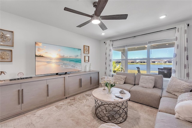 living room with a ceiling fan and recessed lighting