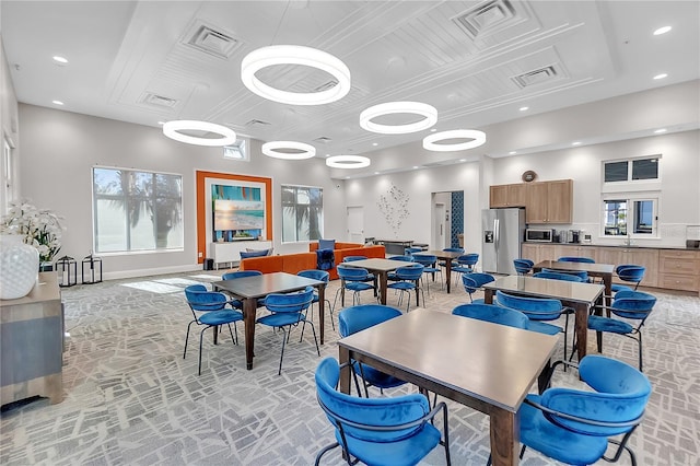 dining room with visible vents and recessed lighting