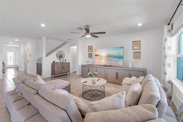 living room featuring recessed lighting, visible vents, ceiling fan, and baseboards