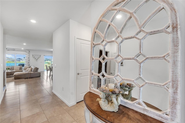 interior details featuring recessed lighting and baseboards