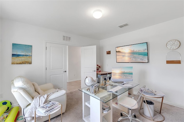 home office featuring light carpet, baseboards, and visible vents