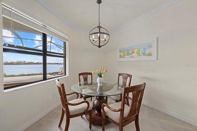 dining room featuring light tile patterned floors, baseboards, a water view, crown molding, and a notable chandelier