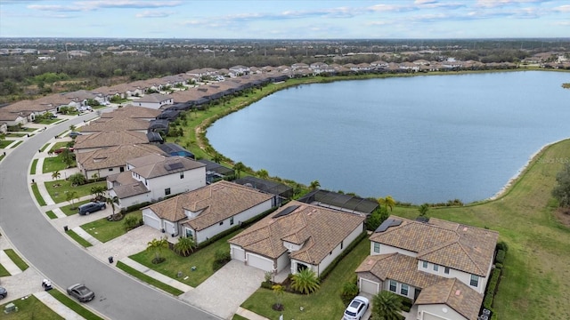 bird's eye view with a water view and a residential view