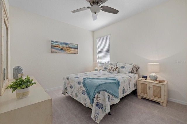 bedroom with carpet, baseboards, and ceiling fan