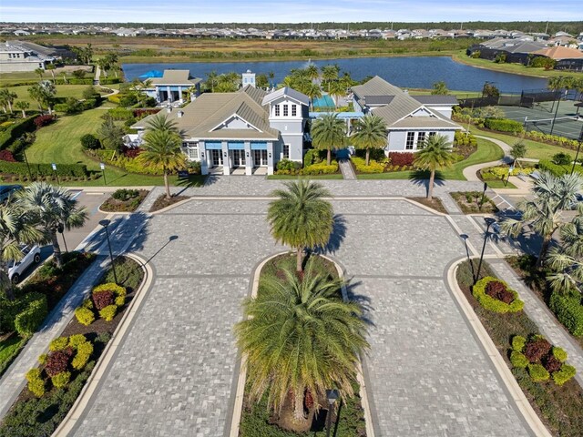 aerial view featuring a residential view and a water view