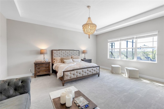 bedroom featuring carpet floors and baseboards