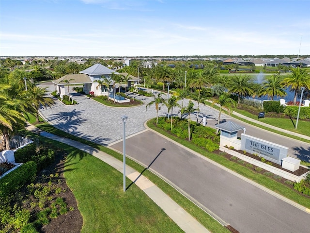 bird's eye view with a residential view and a water view