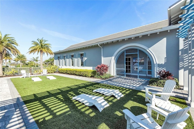 exterior space with a patio area and fence