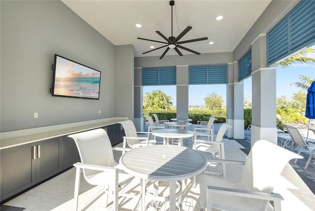 view of patio / terrace featuring a ceiling fan and outdoor dining space