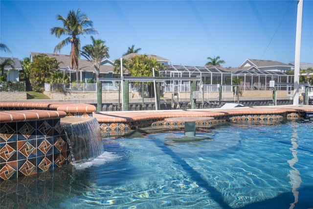 outdoor pool featuring a residential view