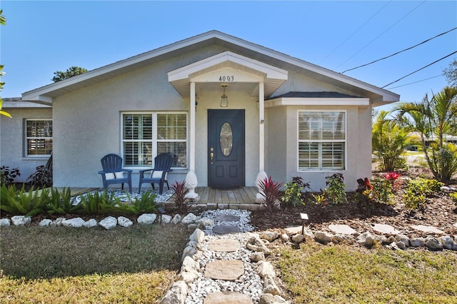 view of front of property featuring stucco siding