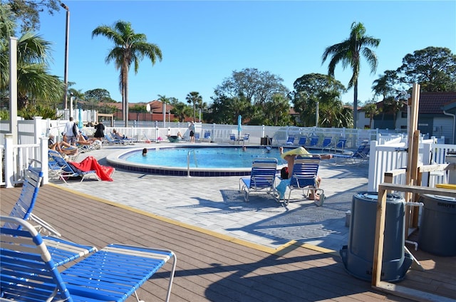 community pool featuring fence