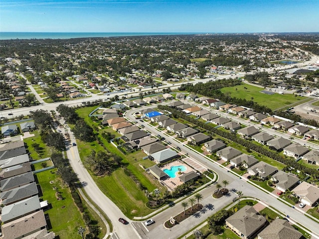 birds eye view of property with a residential view