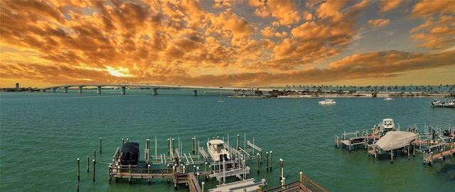 view of dock with a water view and boat lift