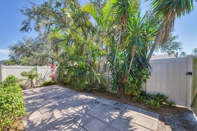 view of patio featuring fence