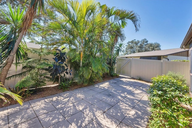 view of patio / terrace featuring fence