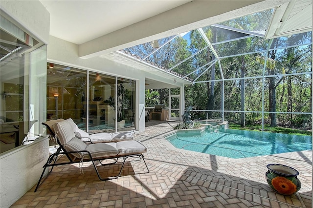 pool with a patio area and a lanai