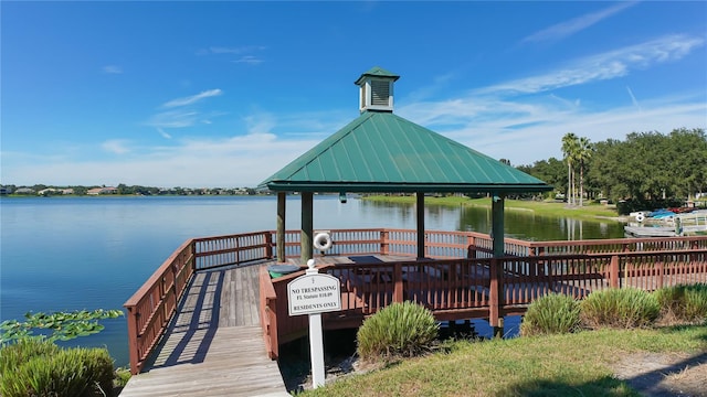 dock area featuring a gazebo and a water view