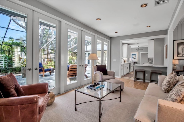 sunroom / solarium with french doors and visible vents