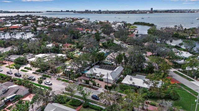 bird's eye view with a water view and a residential view