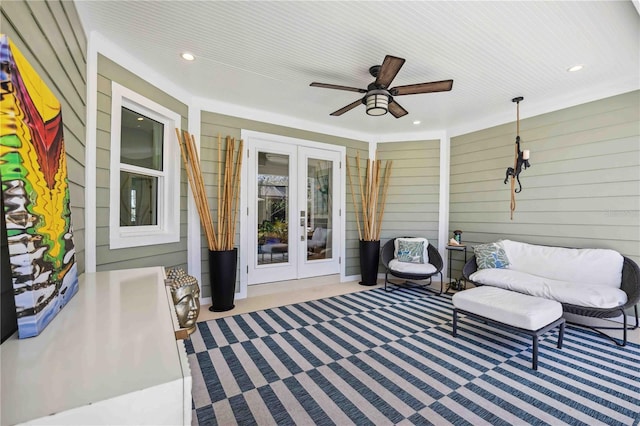 view of patio / terrace featuring ceiling fan and french doors