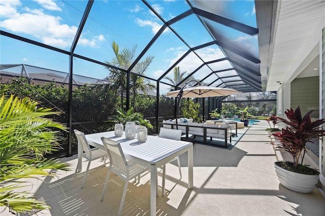 view of patio with glass enclosure, outdoor dining space, and an outdoor pool