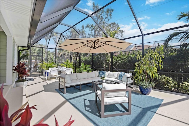 view of patio with outdoor lounge area and a lanai