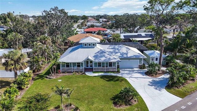 birds eye view of property with a residential view