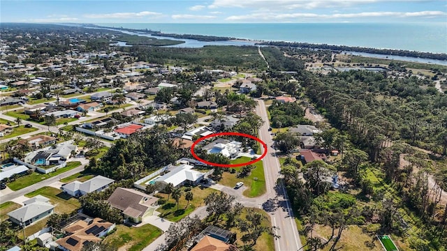 aerial view with a residential view and a water view