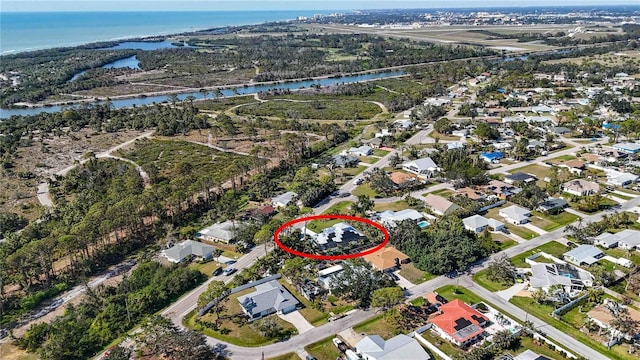 bird's eye view featuring a residential view and a water view