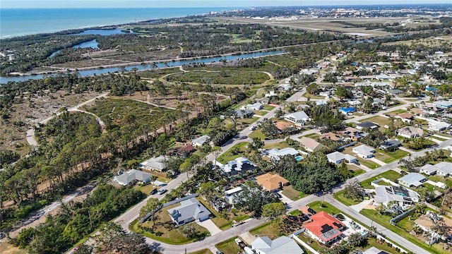 bird's eye view with a water view and a residential view