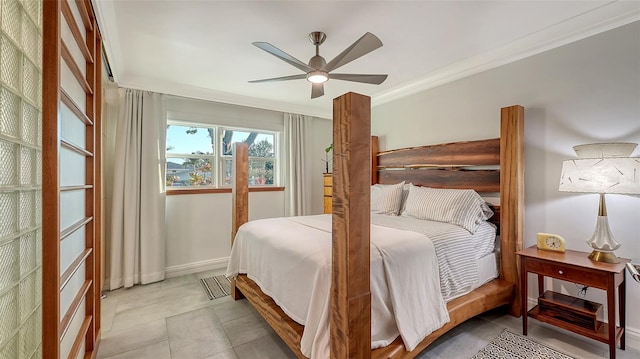 bedroom featuring ceiling fan, baseboards, and crown molding