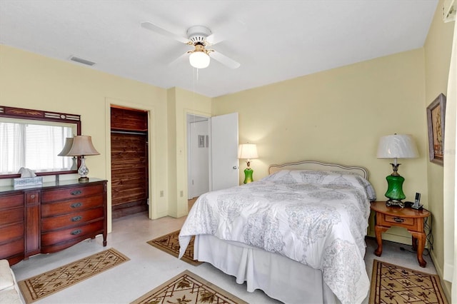 bedroom featuring a ceiling fan, a closet, and visible vents