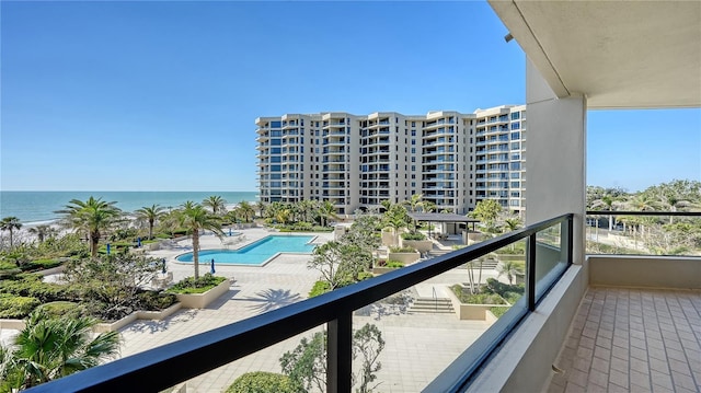 balcony featuring a water view