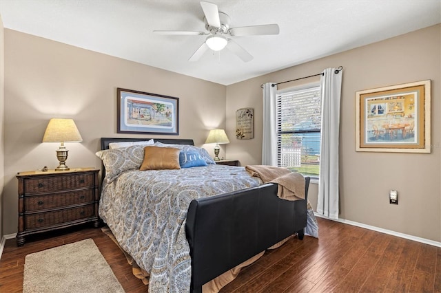 bedroom featuring ceiling fan, dark wood-type flooring, and baseboards