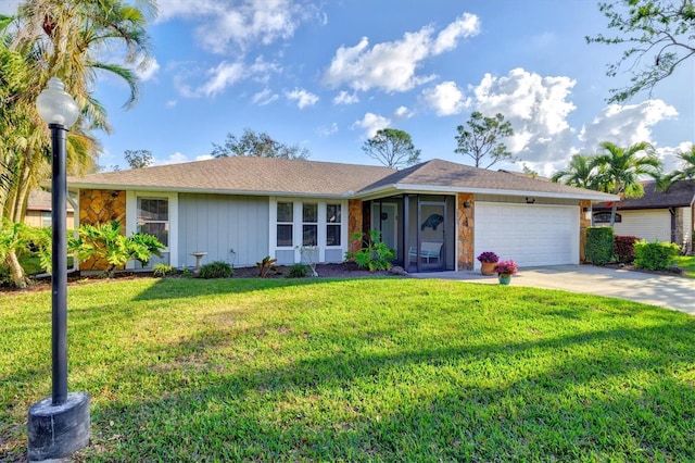 ranch-style house with a garage, concrete driveway, and a front yard