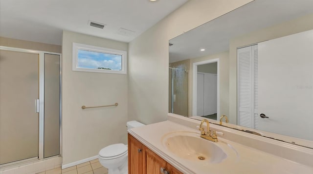 bathroom featuring toilet, a closet, visible vents, and a stall shower