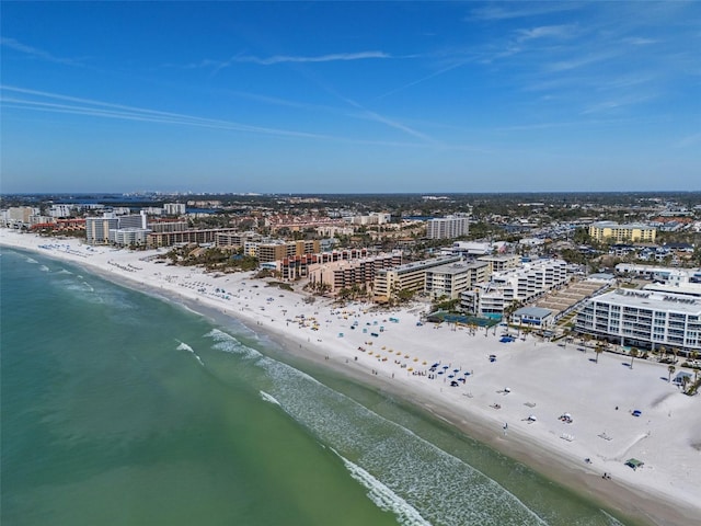 birds eye view of property featuring a city view, a beach view, and a water view