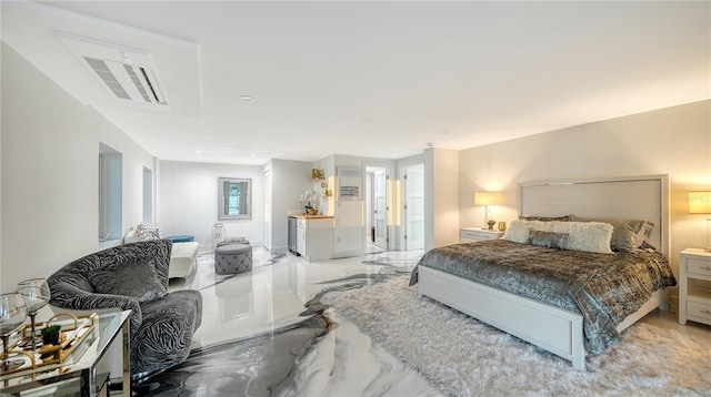 bedroom with marble finish floor and visible vents