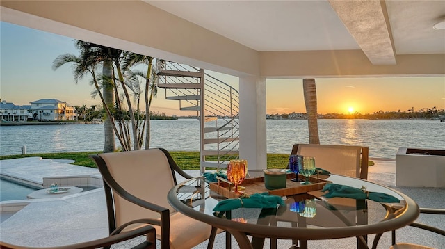 sunroom with a water view