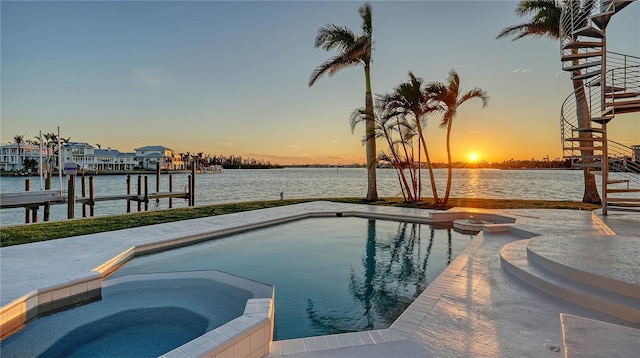 view of pool featuring stairs, a dock, a water view, and a pool with connected hot tub