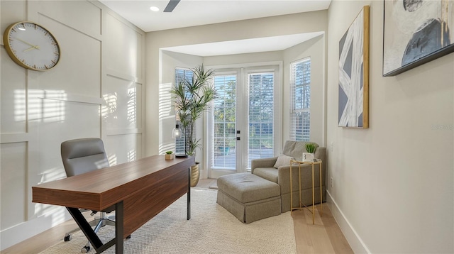 office featuring light wood-style floors and baseboards