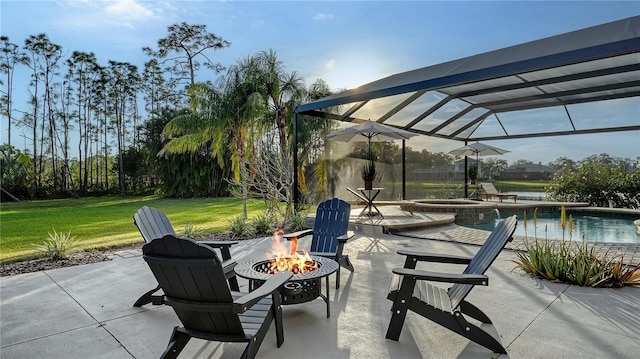 view of patio / terrace featuring a lanai, an outdoor fire pit, an outdoor pool, and an in ground hot tub